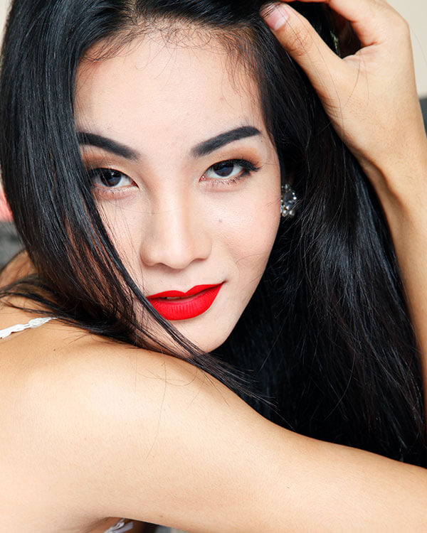 Smiling T-girl chatting during a call